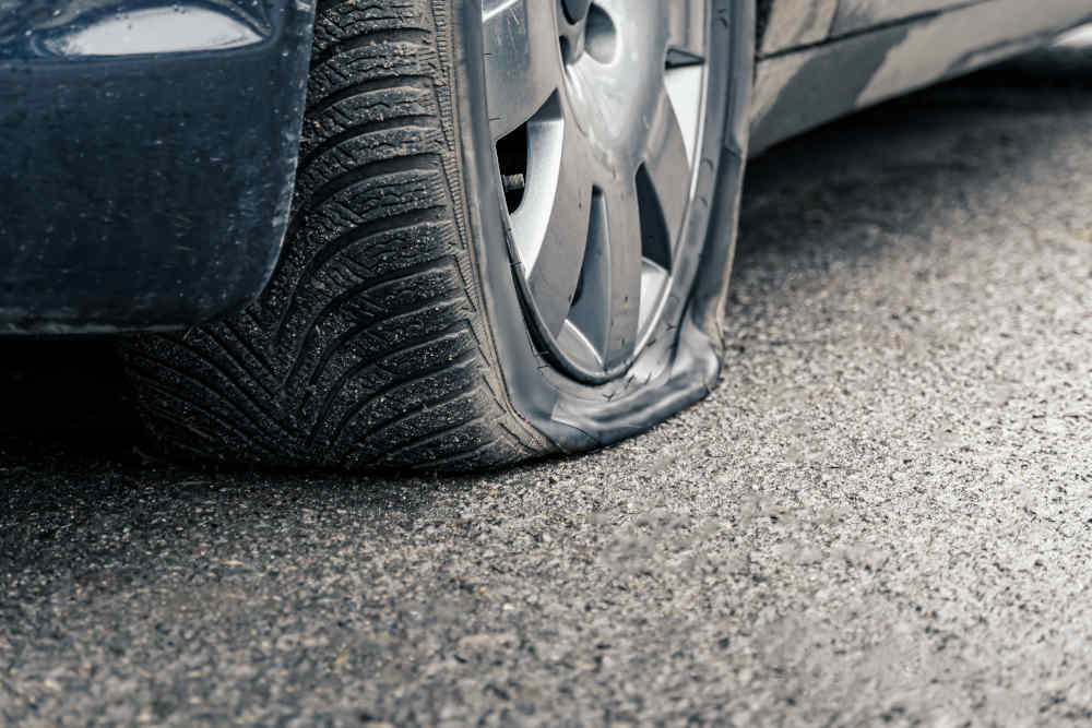 Flat tyre on a car